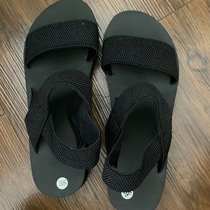Size 7 never worn sandals with foam base and stretchy bands